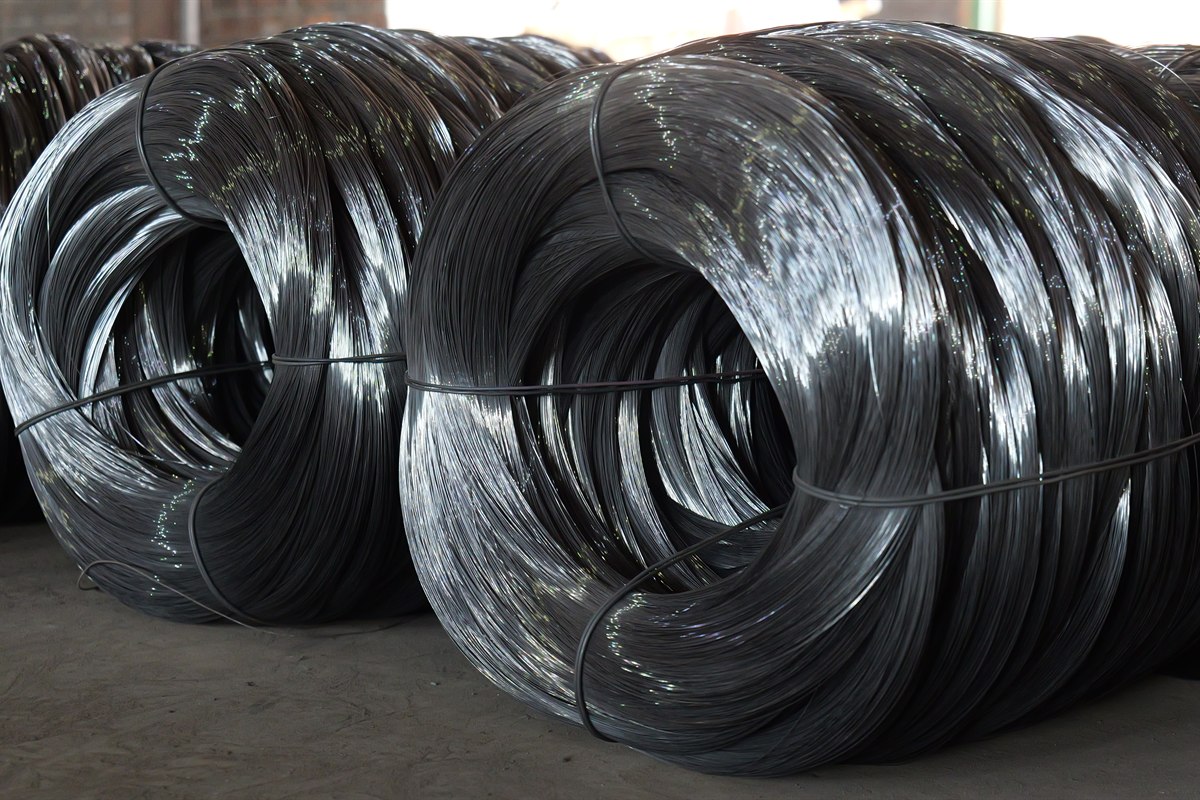 Black annealed wire coils stored for construction binding and bulk supply