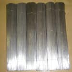 Multiple bundles of galvanized straight cut wire packed for wholesale export | ANJIA