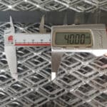 Precise size measurement of expanded metal mesh diamond opening with digital vernier caliper for factory quality assurance | ANJIA