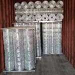 Hot dipped galvanized cattle farm field fence rolls on pallets loading into container for standard export bulk wholesale shipment | ANJIA