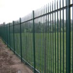 Heavy duty green powder coated steel palisade fence, installed on outdoor slope land for factory perimeter security protection | ANJIA