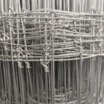 Close-up detail of hinge joint knot woven structure for hot dipped galvanized cattle farm field pasture fence | ANJIA