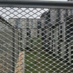 Anti-glare safety fence installed on highway median barrier by ANJIA GROUP