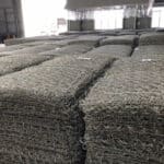 Large quantity flat laid hot galvanized gabion mattress sheets factory storage for bulk export hydraulic project supply | ANJIA