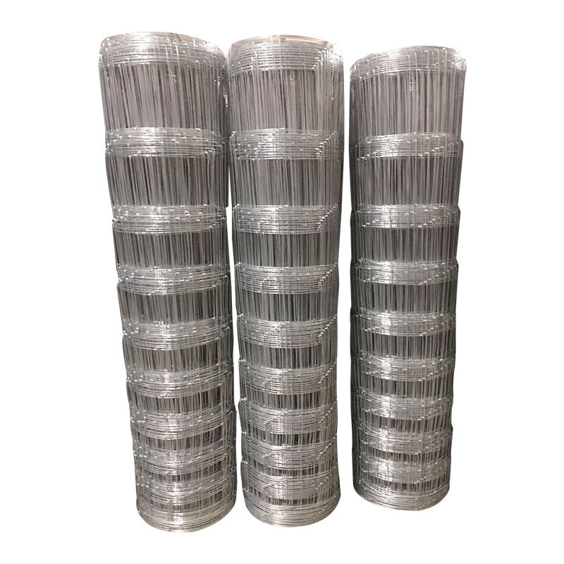Three stacked rolls of hot dipped galvanized fixed knot cattle farm fence for bulk wholesale export | ANJIA
