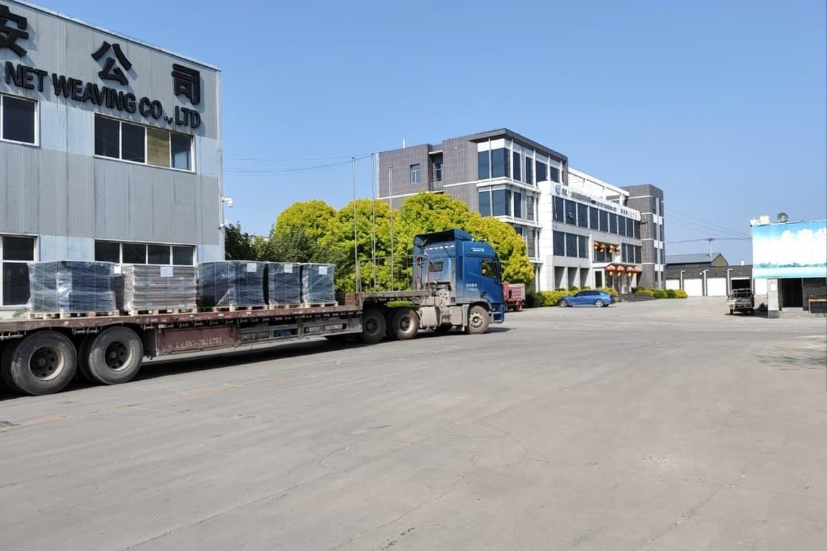 Wire mesh packing and loading audit photo with goods prepared for export shipment