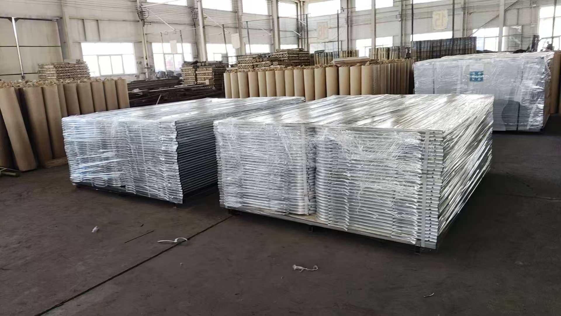 Temporary fence panels packed in stacks for project shipment preparation